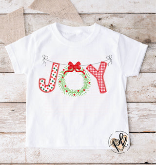 youth size  youth  wreath  trendy  trending  Popular Christmas  popular  peachy keen prints  Mommy and Me  Merry Christmas  KIDS  JOY  holly wreath  graphic tshirt  faux embroidery  DTG  cute  christmas colors  Christmas  bow  berries  adult red patterned words